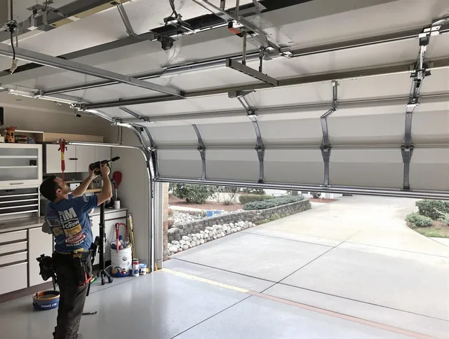 Garage door track repair service by Douglasville Garage Door Repair in Douglasville